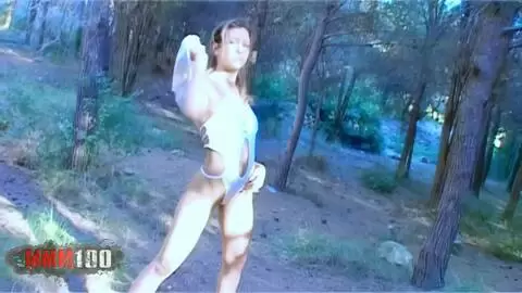 Axelle Mugler posando  en medio del bosque  photo 04