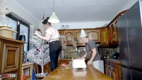 Las grandes tetas de Emmita rebotan en una cogida navideña en la cocina con el duro final anal de Terry photo 01