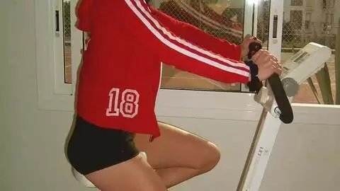 Brunette teen slut gets all sweaty and strips in the gym photo 1