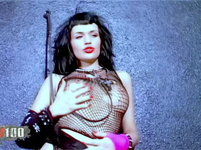 Sexy pornstar making a sado strip photo 1