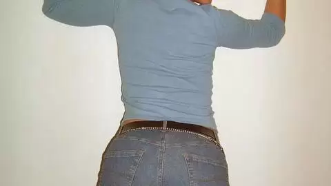 Little horny teen in jeans stripping photo 2